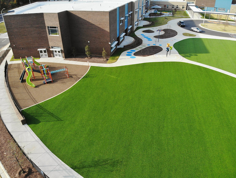 Stough Elementary Playground featuring Playground Grass synthetic turf by ForeverLawn
