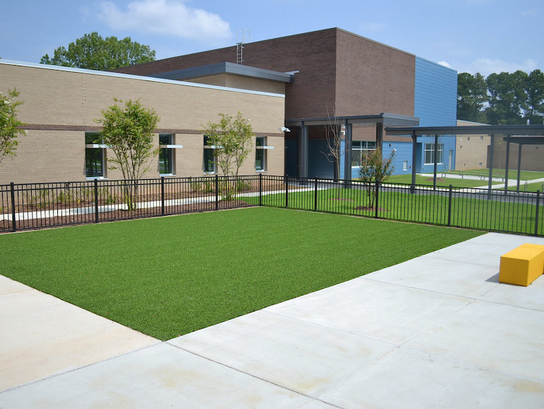 Stough Elementary Playground featuring Playground Grass synthetic turf by ForeverLawn