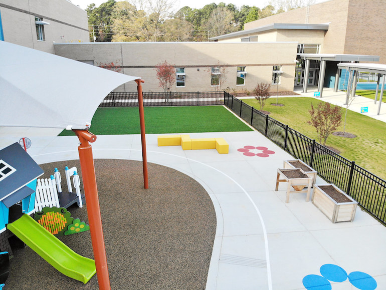 Stough Elementary Playground featuring Playground Grass synthetic turf by ForeverLawn