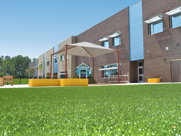 Stough Elementary Playground featuring Playground Grass synthetic turf by ForeverLawn