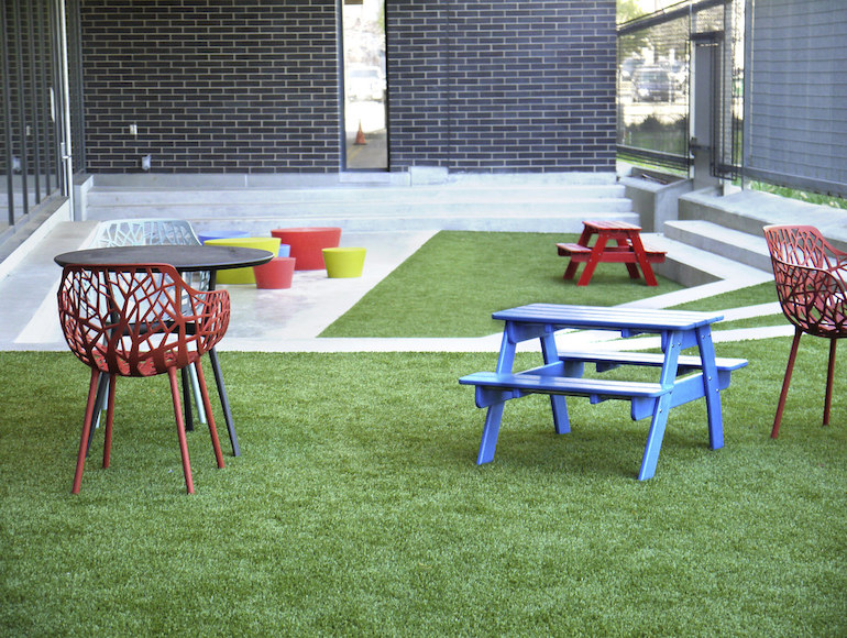 Playground Grass synthetic turf installed at Dayton Metro Library by ForeverLawn of Ohio